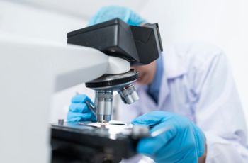 Microscope and lab equipment line drawing